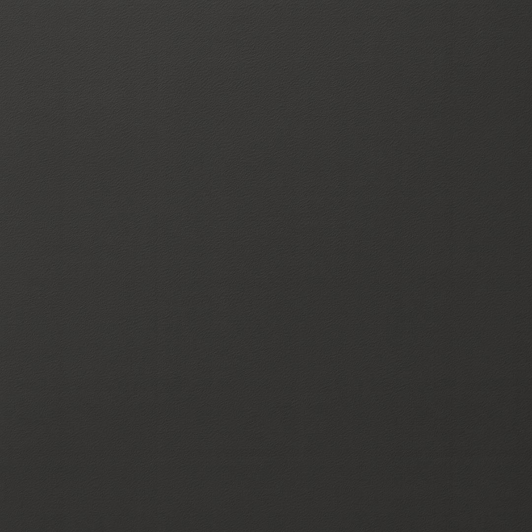 Frisch gestrichene Wand in re-box Wandfarbe Nuit de Cendre No. 48 – tiefes Anthrazit-Schwarz