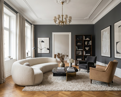 DIY-renovierter Wohnraum mit der Wandfarbe Gutter Black, dunkler Grauton trifft auf warmes Interior – renoviert mit der re-box Renovierungsbox.